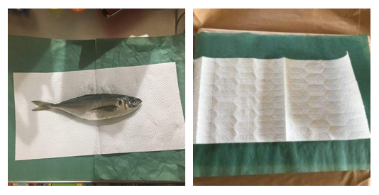 魚を包む緑の紙です